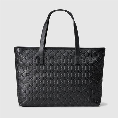 gucci black leather tote bag.